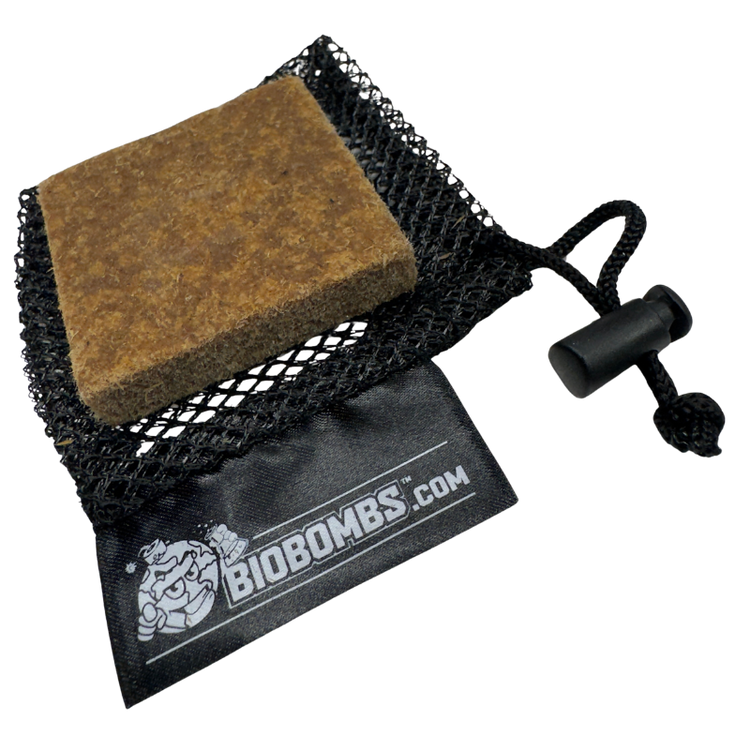 A black mesh storage baggie with a drawstring closure and a Bio-Bombs air freshener bar inside