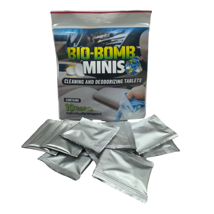 A collection of Bio-Bomb Minis cleaning and deodorizing tablets in different packaging sizes, with branding and product information visible.