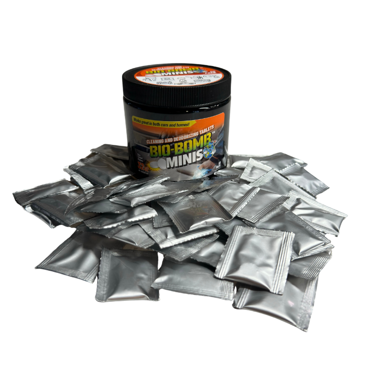 A collection of Bio-Bomb Minis cleaning and deodorizing tablets in different packaging sizes, with branding and product information visible.