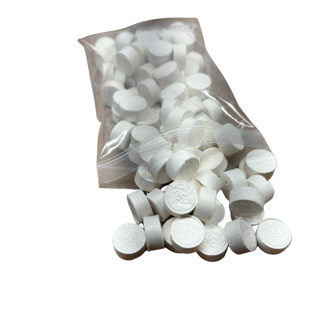 A package of compressed cleaning cloths