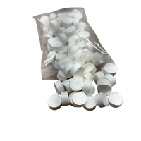 A package of compressed cleaning cloths