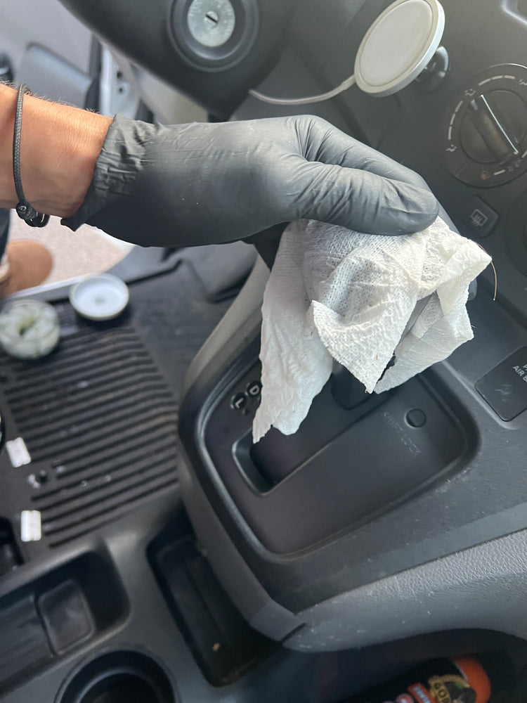 Cleaning a dirty interior with Bio Bomb Compressed Cleaning Cloths